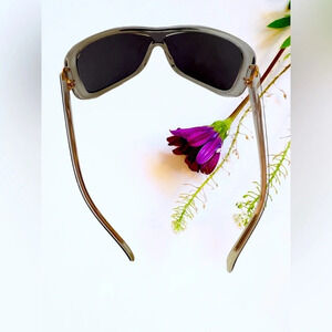 Lilly Pultzer wrap around sunglasses. Lenses has a few small scratches